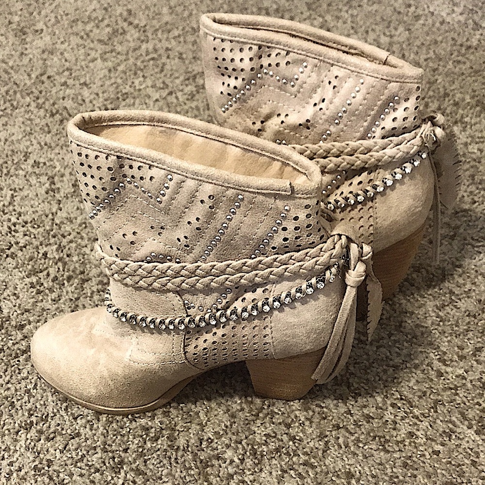 Suede booties w/rhinestone, braids & stud details w/ fringe & feathers on back.
